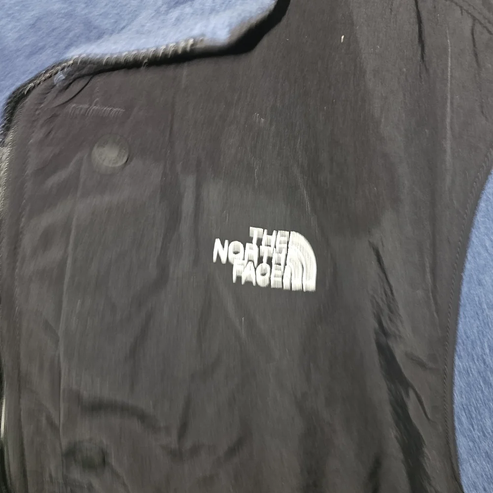 The North Face Men's Black‎ and Navy Performance Jacket